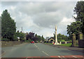 A65 east passing war memorial and church