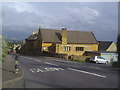 Cotswold stone buildings on the A44, Bourton on the Hill