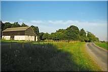 TQ9091 : Farm Road at Hampton Barns by Glyn Baker