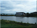 River Dee and industrial buildings seen from Wales Coast Path