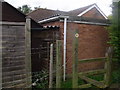 Stile on path between gardens, Kinsham