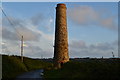 Chimney beside lane