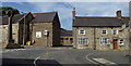 Cottages and village cross, Crich