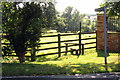 Stile and path to Aspley Hall