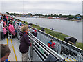 Paralympic rowing, spectators on a rainy morning