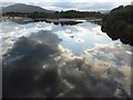 Reflections in still evening waters