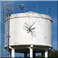TQ5980 : Sculpture on water tower by Roger Jones