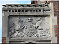 Panel above the side entrance of the former County Court, Church Street, BN1