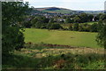 Path across playing fields to Buxton