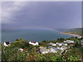 Rainbow ending at Llanina