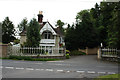 Merstham:  Lodge and gates to Rockshaw House