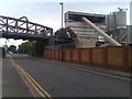 Giant hopper, silos and railway bridge in Albert Road