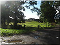 Entrance to field, cottage and track