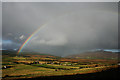 NR9032 : Rainbow over Machrie Moor by Anne Burgess