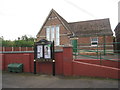 Village noticeboard and Village Hall, Weston