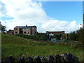 Station House and railway bridge at Newsholme