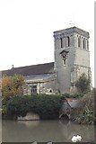 SP7408 : Haddenham: St Mary's church and duckpond by Christopher Hilton