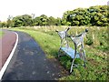 Ornamental bench adjacent footpath and cycleway