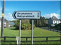 Direction sign at the junction of  Crawfordstown Road and Loughinisland Road