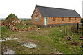Farm building and rubble