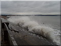 SZ2991 : Milford on Sea: waves strike the sea wall by Chris Downer