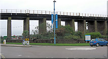SW5537 : B3301 passes under railway viaduct by Stuart Logan