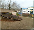 Former colliery winding wheel at the southern entrance to Parc Nantgarw