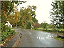 NX9666 : Road junction on the A710 by Ann Cook