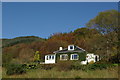 Ivy-clad cottage below Creag na Bonaid