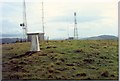 NO1020 : Trig point and masts on Mailer Hill by Roger Templeman