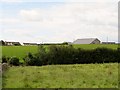 View south-westwards across farmland towards the Ballinran Community Centre