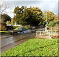 Driving through a minor flood on Henbury Road, Bristol 