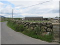 Farmhouse and farm buildings on the south side of Brackenagh West Road