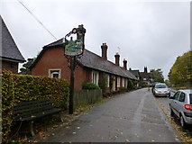 TL4218 : Village sign and Almshouses, High Street, Much Hadham by PAUL FARMER
