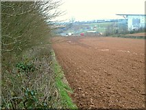 SX9693 : Ploughed field beside Exeter Business Park by Derek Harper