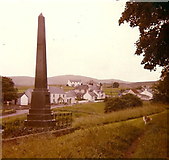 NS8815 : William Symington Monument and the village of Leadhills by Elliott Simpson