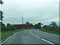 C3708 : Farm buildings alongside the A5 between Magheramason and Bready by Eric Jones