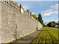 Wall topped by balustrade