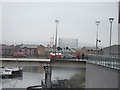 View of the Trafalgar Way bridge and a gas holder in Greenwich from One Churchill Place