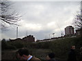 View of Canary Wharf, the hospital chimney, Rebecca House and Windermere House from the St Clement