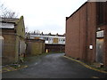 View of the rear of houses on Brokesley Street from the St Clement