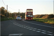 SX4054 : A bus departs from Antony by roger geach
