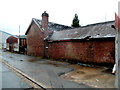 A fire-damaged part of the former Railway Tavern, Cinderford