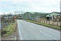 B957 past farm buildings at Barnyards