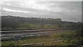 In the distance canal boats taken from an East Midlands train