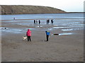 TA1280 : Midday, New Year's Day, Filey beach by Pauline E