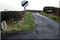 The Dalrymple Road from Kirkmichael with milestone