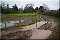 Muddy farm track by Moat Farm