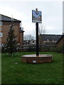 Pokesdown: sign and Christmas tree on Pokesdown Green