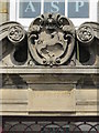 Crest and date stone above a doorway to offices, The Cross, TN6